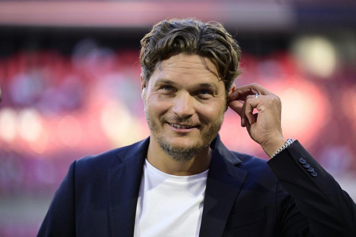 German former player and coach Edin Terzic reacts as he acts as TV expert prior to the start of the 2026 World Cup qualifiers Europe zone group A football match between Germany and Northern Ireland on September 7, 2025 in Cologne, western Germany. INA FASSBENDER / AFP