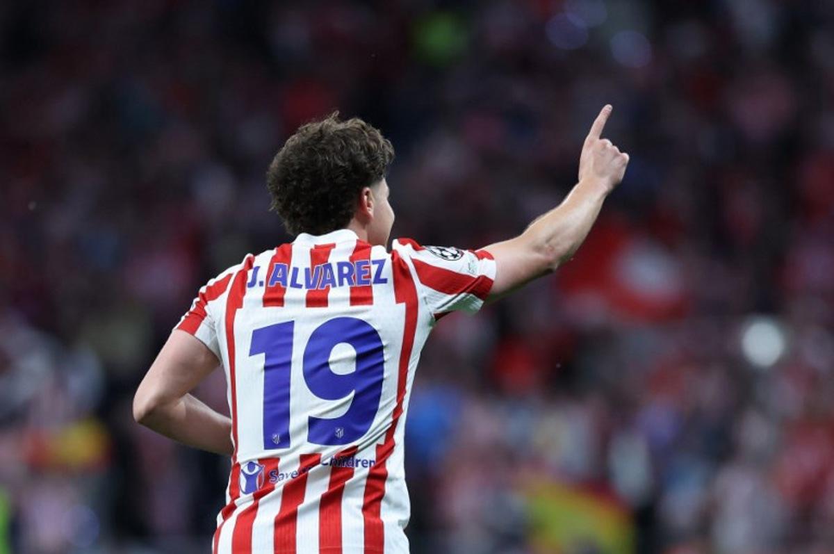 Atletico Madrid's Argentine forward #19 Julian Alvarez celebrates scoring an equalizing goal during the UEFA Champions League semi-final first leg football match between Club Atletico de Madrid and Arsenal at the Metropolitano stadium in Madrid on April 29, 2026. Thomas COEX / AFP