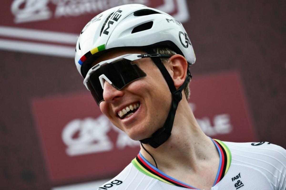 UAE Team Emirates's Slovenian Tadej Pogacar smiles ahead of the 20th one-day classic 'Strade Bianche' (White Roads) men's cycling race between Siena and Siena in Tuscany on March 7, 2026. Marco BERTORELLO / AFP