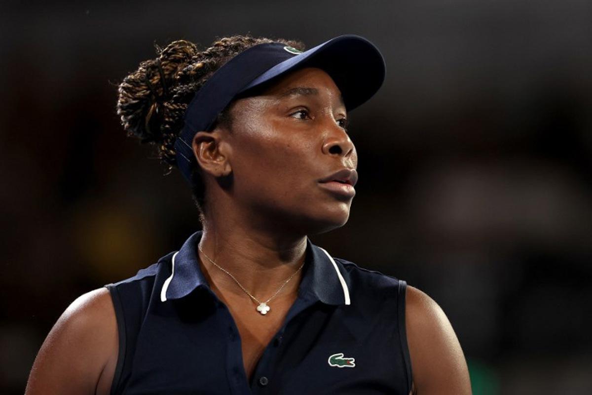 USA's Venus Williams reacts on a point to Serbia's Olga Danilovic during their women's singles match on day one of the Australian Open tennis tournament in Melbourne on January 18, 2026. Martin KEEP / AFP
