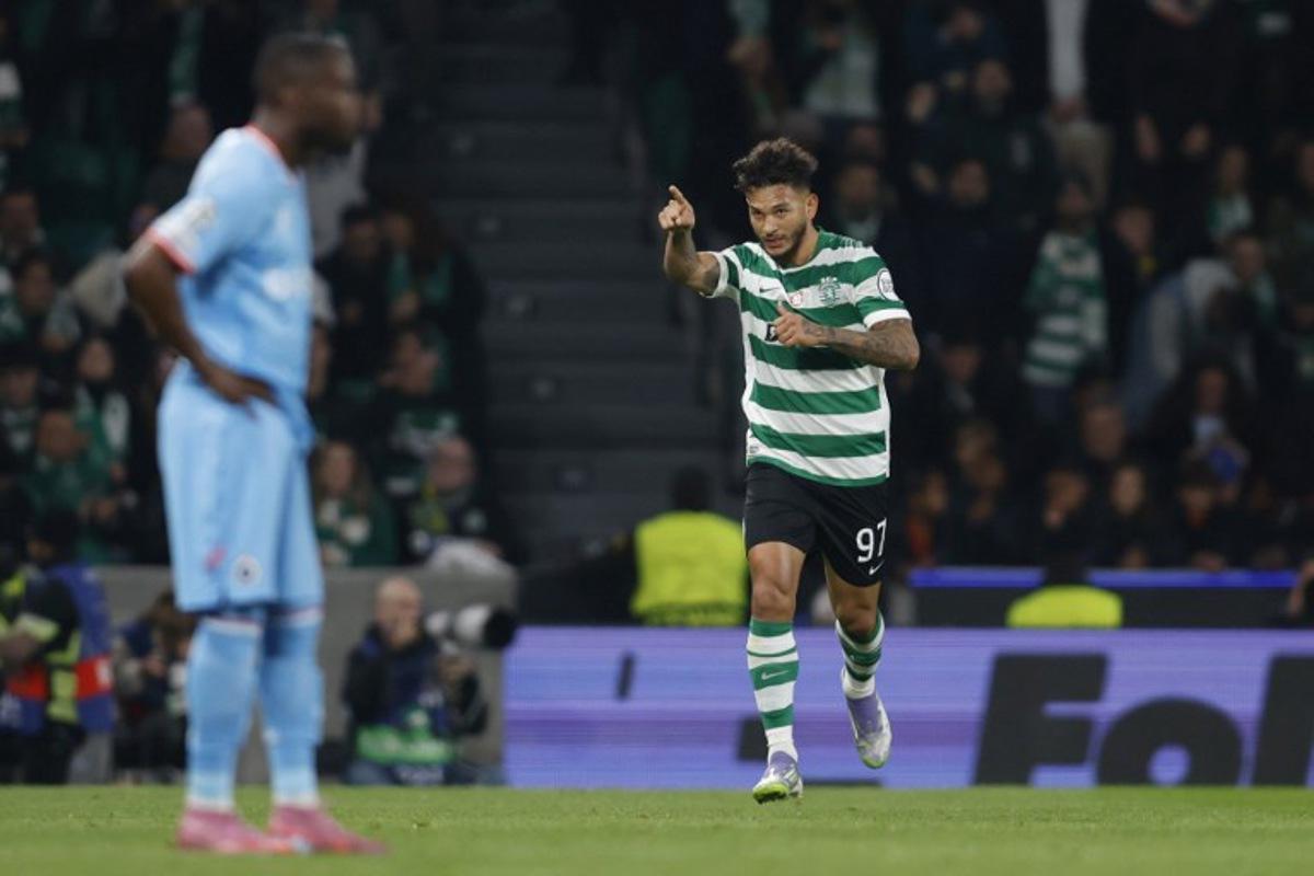 Sporting Lisbon's Colombian forward #97 Luis Suarez celebrates scoring his team's second goal during the UEFA Champions League, league phase day 5 football match between Sporting CP and Club Brugge at Jose Alvalade stadium in Lisbon on November 26, 2025. FILIPE AMORIM / AFP
