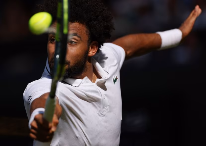 France's Arthur Fils returns against Italy's Matteo Berrettini during their men's singles second round tennis match on the fourth day of the 2026 Wimbledon Championships at The All England Lawn Tennis and Croquet Club in Wimbledon, southwest London, on July 2, 2026. Adrian Dennis / AFP
