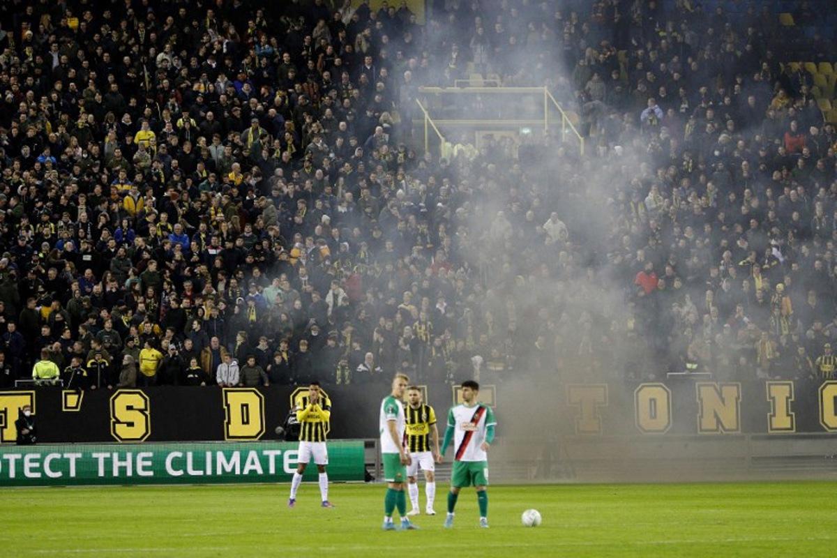 Supporters cheer players prior to the Conference League Play-off match between Vitesse and Rapid Vienna in the Gelredome in Arnhem, Netherlands, on February 24, 2022. Jeroen Putmans / ANP / AFP