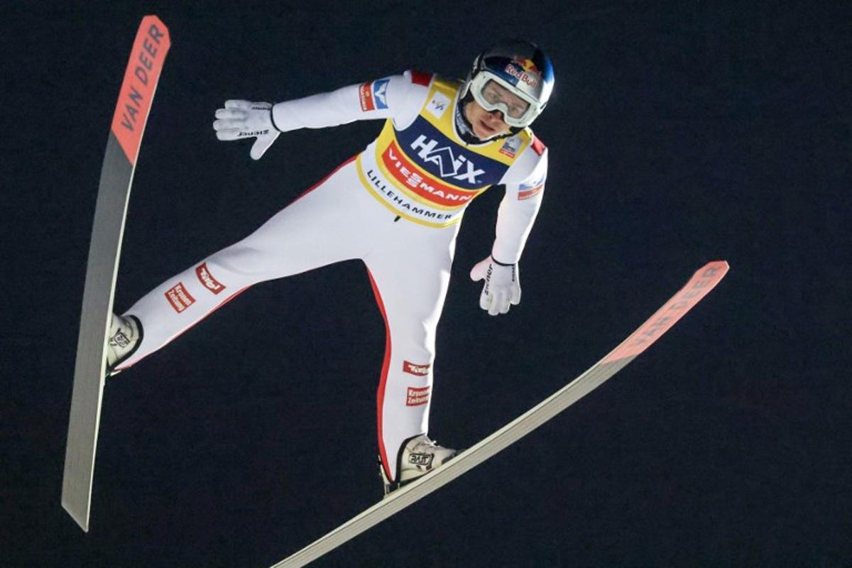 Austria's Daniel Tschofenig soars through the air during the Men's Large Hill HS140 competition of the FIS Ski Jumping World Cup in Lillehammer, Norway on November 23, 2025. Geir Olsen / NTB / AFP