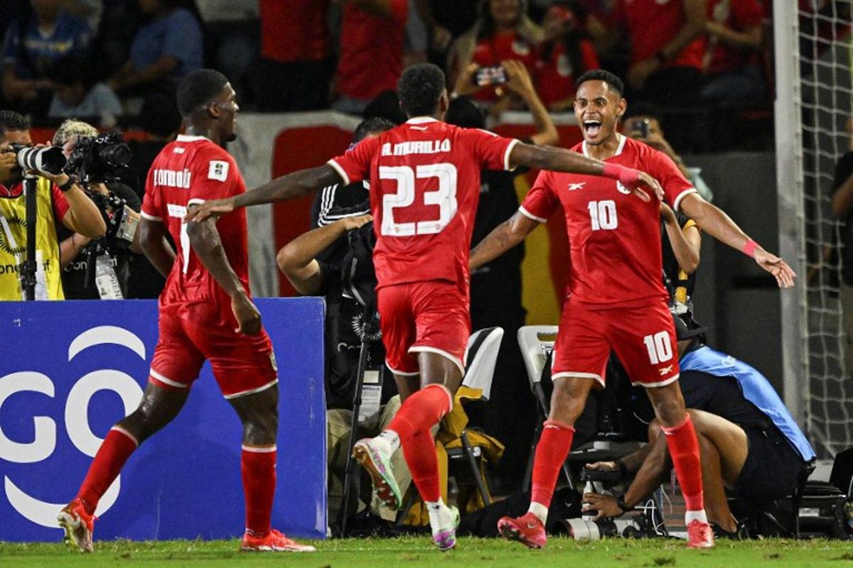 Panama's forward #10 Ismael Diaz (R) celebrates with teammates after scoring a goal during the 2026 FIFA World Cup Concacaf qualifier football match between Panama and Nicaragua at the Rommel Fernandez Gutierrez stadium in Panama City on June 10, 2025. MARTIN BERNETTI / AFP