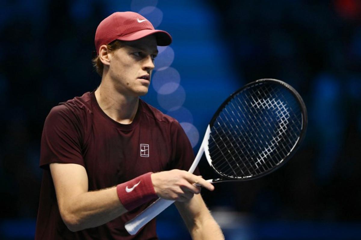 Italy's Jannik Sinner reacts during his match against USA's Ben Shelton at the ATP Finals tennis tournament in Turin on November 14, 2025. Marco BERTORELLO / AFP