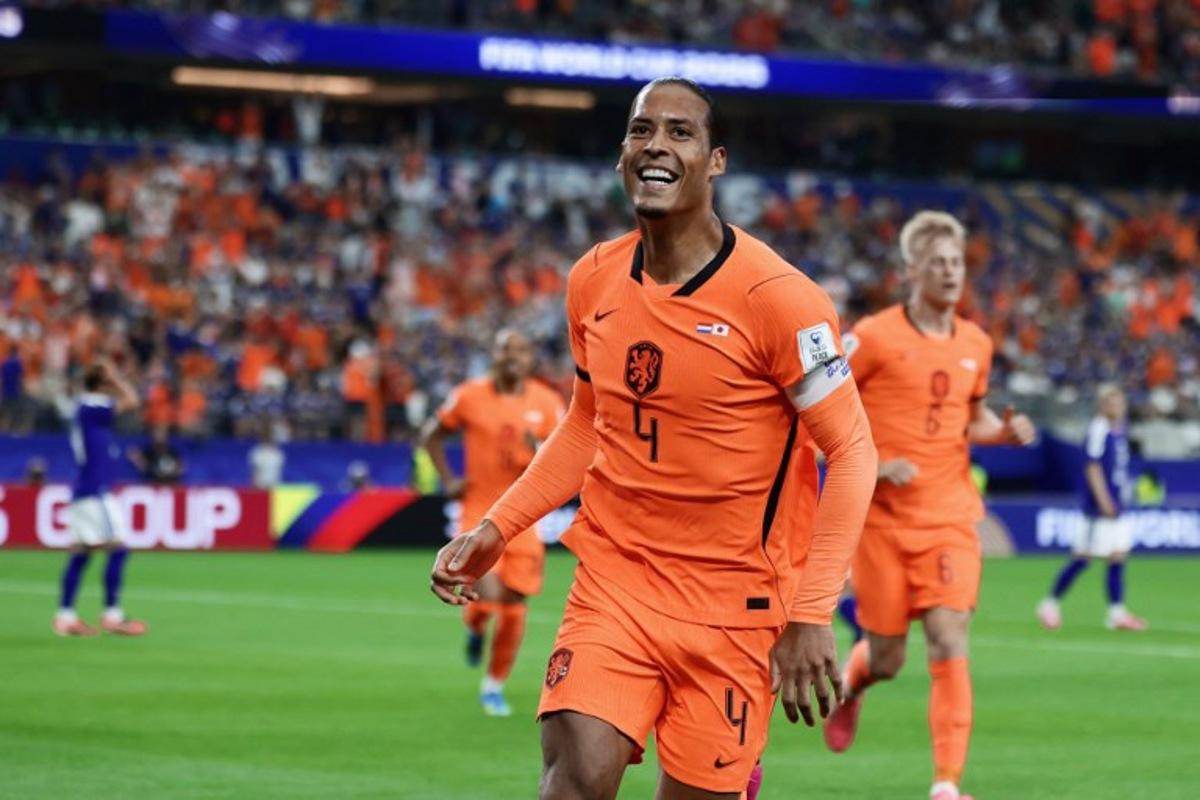 Netherlands' defender #04 Virgil van Dijk celebrates after scoring the opening goal during the 2026 World Cup Group F football match between the Netherlands and Japan at the Dallas Stadium in Arlington on June 14, 2026. Aric Becker / AFP