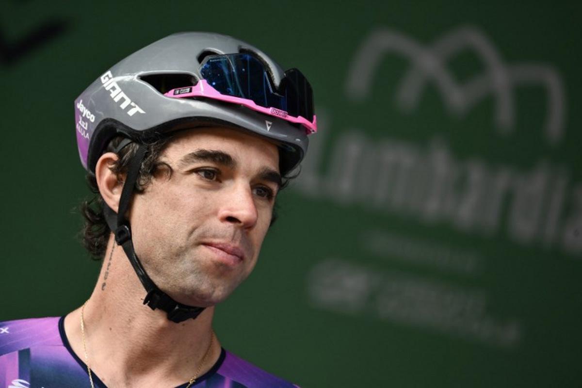 Team Jayco AlUla's Australian riderMichael Matthews looks on from the sign-in podium ahead of the 119th edition of the Giro di Lombardia (Tour of Lombardy), a 238km cycling race from Como to Bergamo on October 11, 2025. Marco BERTORELLO / AFP