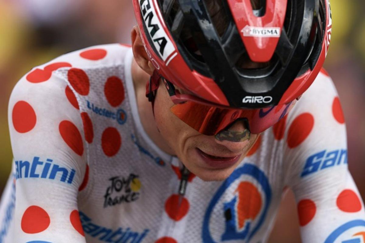 Team Visma | Lease a Bike's Danish rider Jonas Vingegaard wearing the climber's dotted "King of the Mountains" jersey cycles to the finish of the 14th stage of the 113th edition of the Tour de France cycling race, 155,3 km between Mulhouse and Le Markstein in the Vosges mountains, on July 18, 2026. Anne-Christine POUJOULAT / AFP