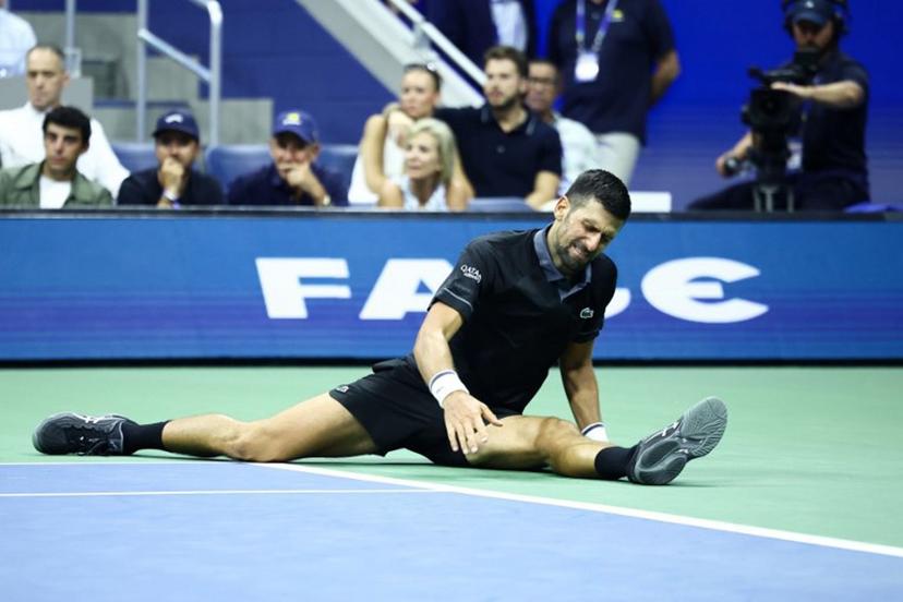 Serbia's Novak Djokovic reacts against Argentina's Mariano Navone during the men's singles first round tennis match on day one of the US Open tennis tournament at the USTA Billie Jean King National Tennis Center in New York City on August 30, 2026. CHARLY TRIBALLEAU / AFP
