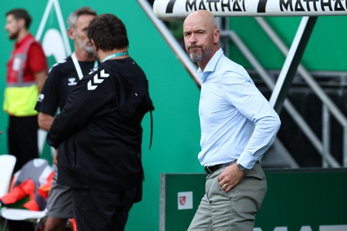 Bayer Leverkusen's Dutch head coach Erik ten Hag looks on ahead the German first division Bundesliga football match between Werder Bremen and Bayer Leverkusen in Bremen on August 30, 2025. Ibrahim OT / AFP