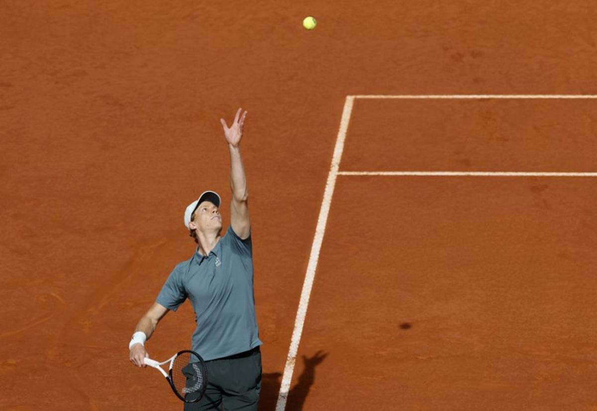 Italy's Jannik Sinner serves to Germany's Alexander Zverev during the 2026 ATP Tour Madrid Open tennis tournament final singles match at the Caja Magica in Madrid, on May 3, 2026. Oscar DEL POZO / AFP