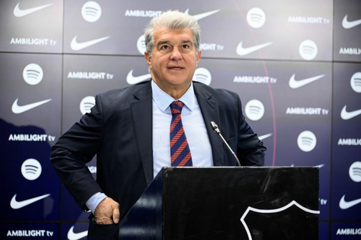 FC Barcelona's President Joan Laporta arrives for a press conference at the Ciudad Deportiva Joan Gamper in Sant Joan Despi, near Barcelona, on January 14, 2025. Dani Olmo's future at Barcelona remains in the balance as the Catalan club pursue their legal battle to get the midfielder registered to play once more. FC Barcelona's failure to meet La Liga's budgetary rules to license both Olmo and forward Pau Victor before the end of last year currently leaves them ineligible to play for the rest of the season. Josep LAGO / AFP