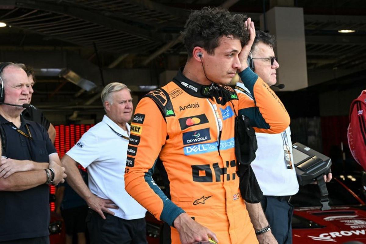 McLaren's British driver Lando Norris exits his car after finishing in the pole position during Sprint qualifying ahead of the 2026 Miami Formula One Grand Prix at Miami International Autodrome in Miami Gardens, Florida, on May 1, 2026. CHANDAN KHANNA / AFP