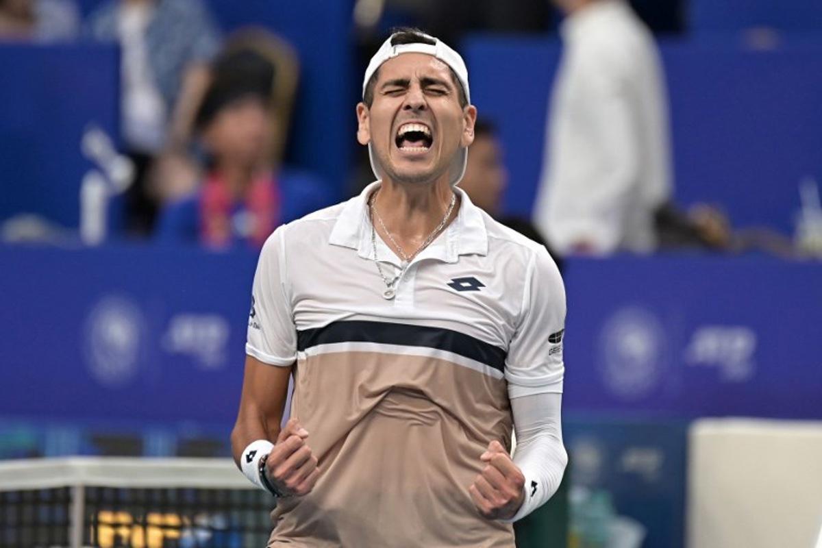 Chile's Alejandro Tabilo celebrates beating USA's Brandon Nakashima in their men's singles semi-final match at the Chengdu Open tennis tournament in Chengdu, in China's southwest Sichuan province on September 22, 2025. STR / AFP