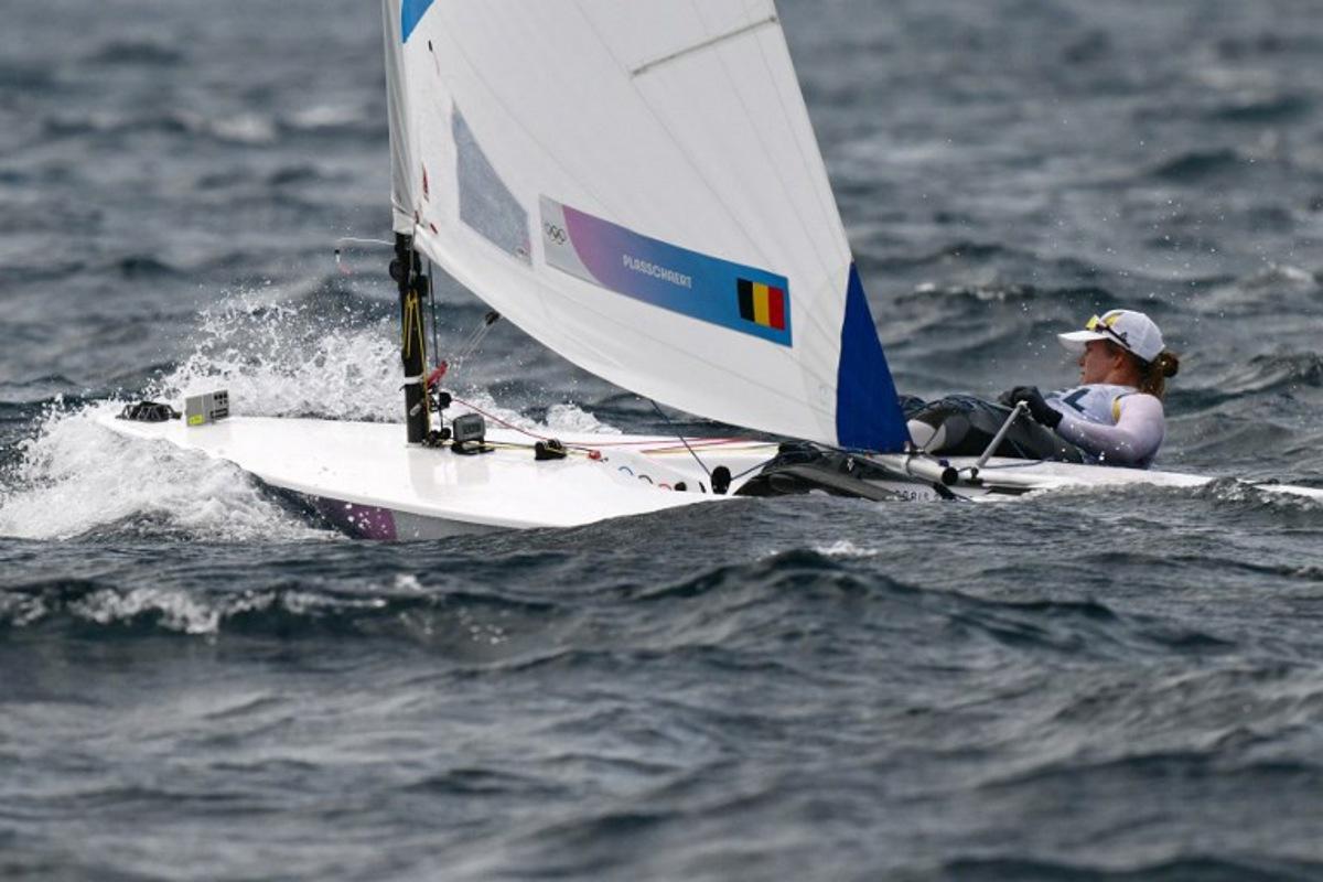 Belgium's Emma Plasschaert competes in the medal race of the women's ILCA 6 single-handed dinghy event during the Paris 2024 Olympic Games sailing competition at the Roucas-Blanc Marina in Marseille on August 7, 2024. Christophe SIMON / AFP