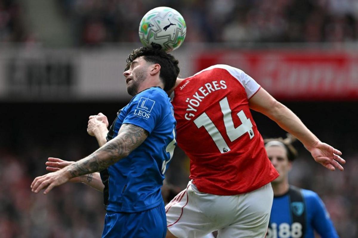 Bournemouth's Argentinian defender #05 Marcos Senesi (L) clashes with Arsenal's Swedish striker #14 Viktor Gyokeres (R) during the English Premier League football match between Arsenal and Bournemouth at the Emirates Stadium in London on April 11, 2026. Glyn KIRK / AFP
