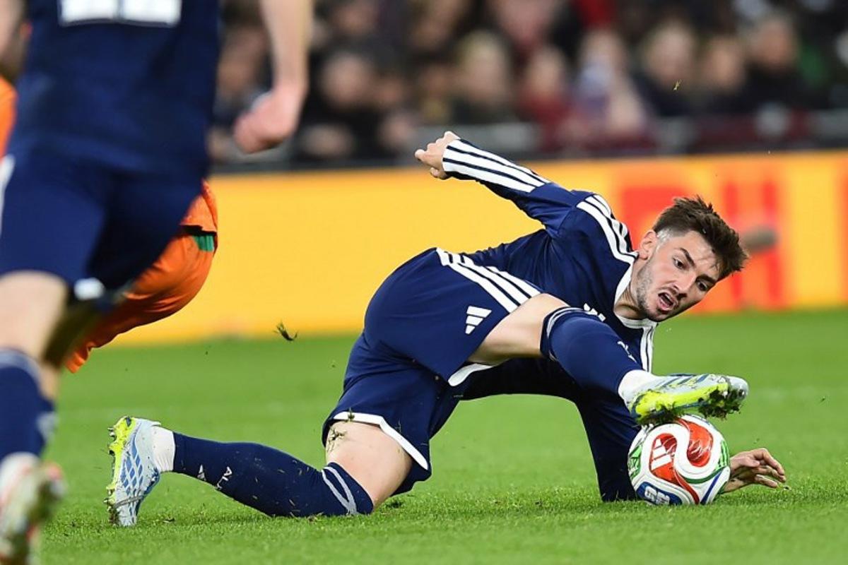 Scotland's midfielder #08 Billy Gilmour controls the ball during the friendly international football match between Scotland and Ivory Coast at the Hill Dickinson Stadium in Liverpool, north west England on March 31, 2026. PETER POWELL / AFP