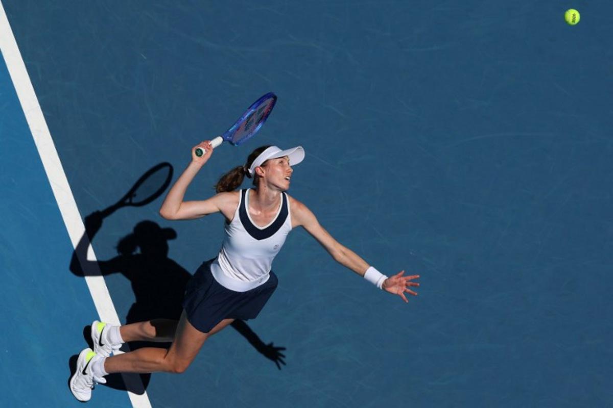 Spain's Cristina Bucsa serves to Ukraine's Elina Svitolina during their women's singles match on day one of the Australian Open tennis tournament in Melbourne on January 18, 2026. Martin KEEP / AFP