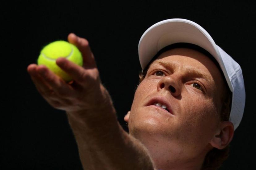Italy's Jannik Sinner serves to US player Jenson Brooksby during their men's singles third round tennis match on the fifth day of the 2026 Wimbledon Championships at The All England Lawn Tennis and Croquet Club in Wimbledon, southwest London, on July 3, 2026. Adrian DENNIS / AFP