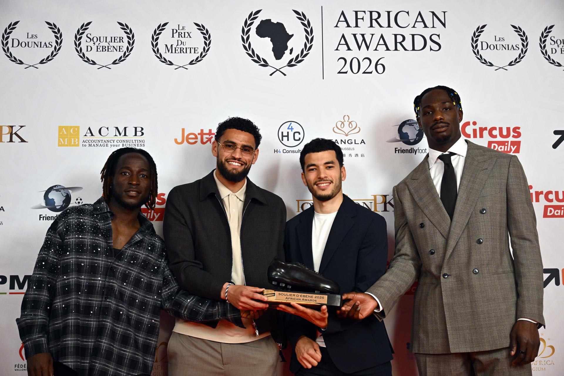The nominees for the Ebony Shoe, Charleroi's Parfait Guiagon, Zorgane Adem of Union Saint-Gilloise, Genk's Zakaria El Ouahdi and David Promise of Union Saint-Gilloise pose for the photographer during the 2026 edition of the 'Gala of the Ebony Shoe' soccer trophy in Brussels, Monday 04 May 2026. The Ebony Shoe award is given to the best African player or player of African descend in the Jupiler Pro League Belgian first division soccer competition. BELGA PHOTO ERIC LALMAND