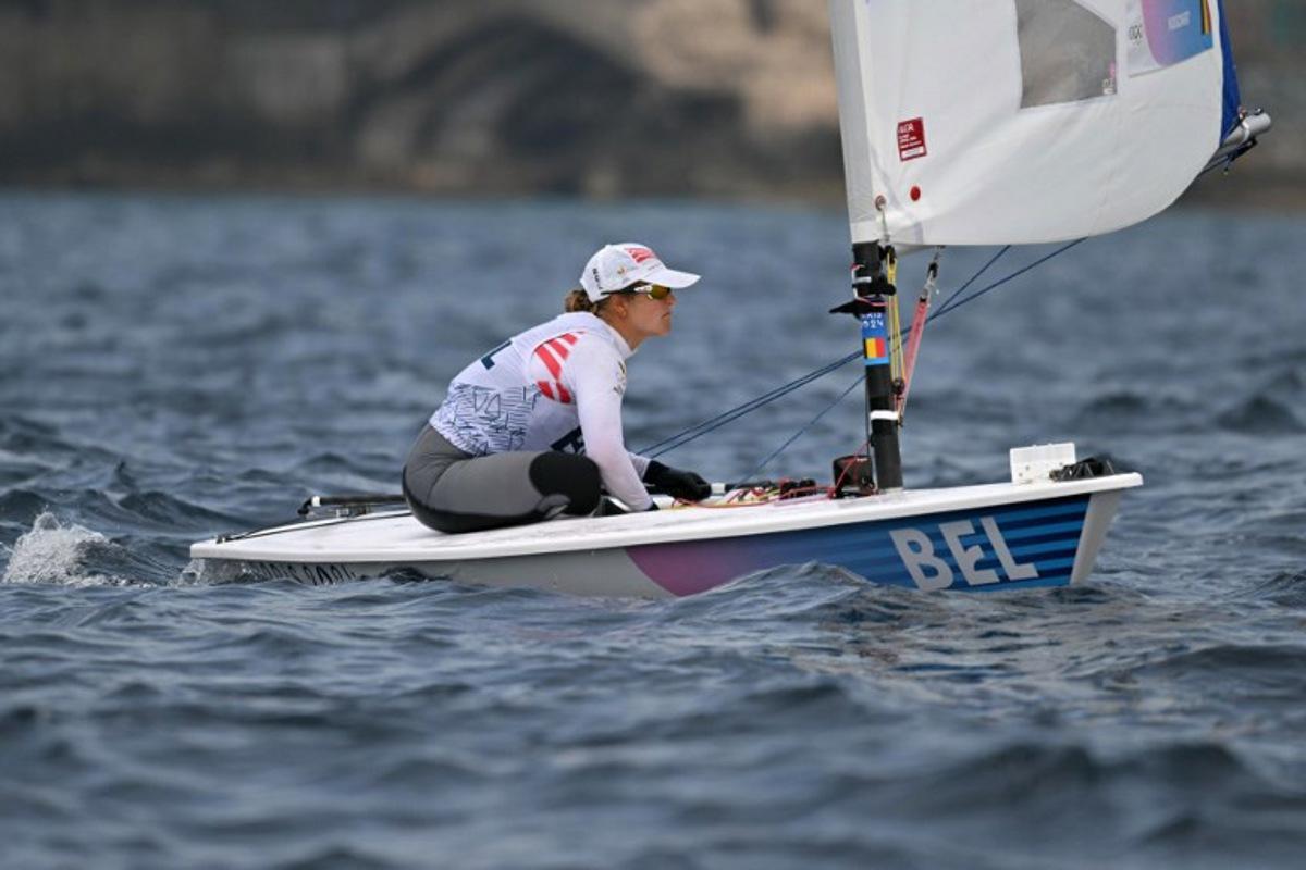 Belgium's Emma Plasschaert prepares for the medal race of the women's ILCA 6 single-handed dinghy event during the Paris 2024 Olympic Games sailing competition at the Roucas-Blanc Marina in Marseille on August 7, 2024. NICOLAS TUCAT / AFP