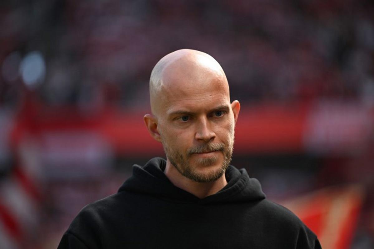 FC Cologne's Czech head coach Rene Wagner looks on prior to the German first division Bundesliga football match 1 FC Cologne v Bayer 04 Leverkusen in Cologne, western Germany, on April 25, 2026. INA FASSBENDER / AFP