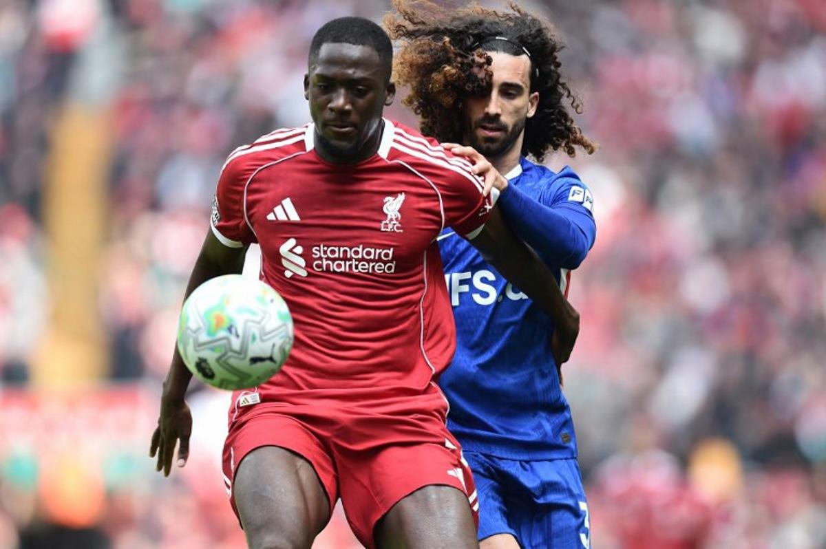 Chelsea's Spanish defender #03 Marc Cucurella (R) vies with Liverpool's French defender #05 Ibrahima Konate during the English Premier League football match between Liverpool and Chelsea at Anfield in Liverpool, north west England on May 9, 2026. PETER POWELL / AFP