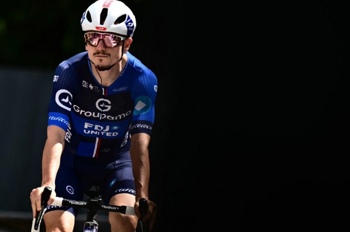 Team Groupama-FDJ's French rider David Gaudu prepares to take the start of the third stage of the Vuelta a Espana, a 134 km race between San Maurizio Canavese and Ceres, in Italy's Piemonte region, on August 25, 2025. Marco BERTORELLO / AFP