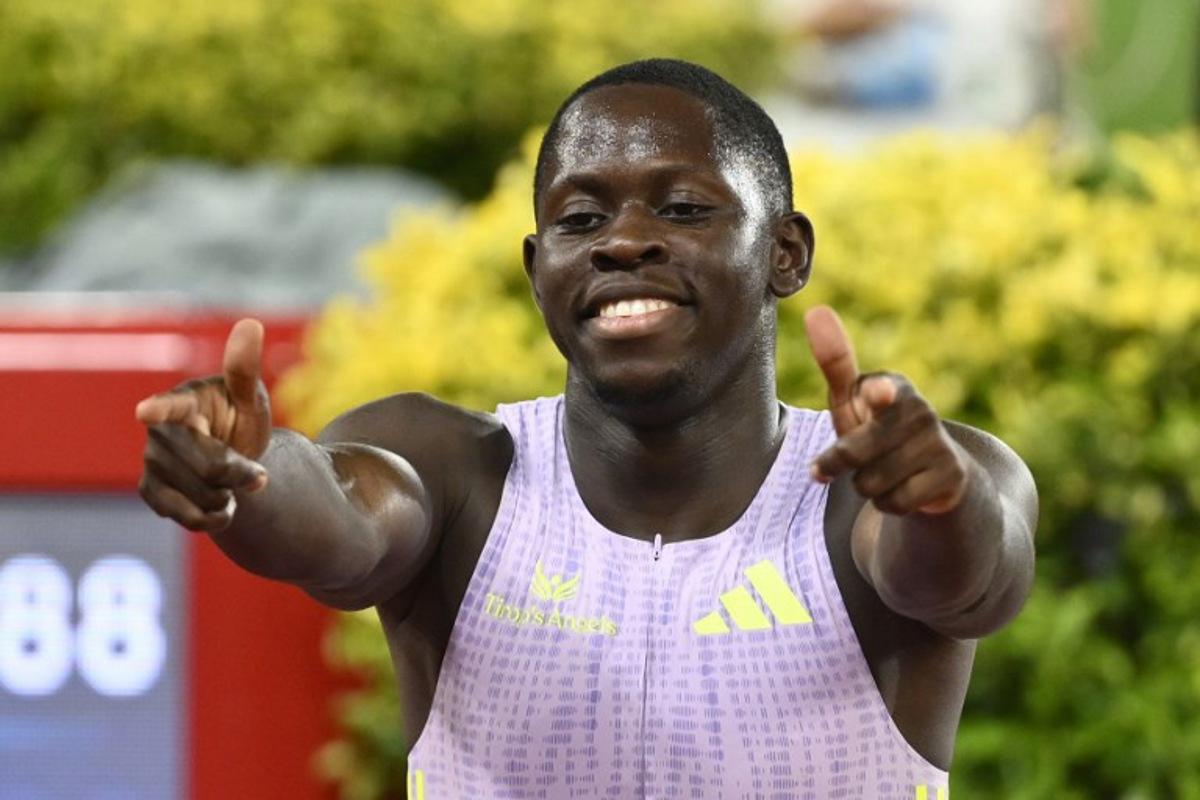 Jamaica's Oblique Seville celebrates after winning the men's 100m during the Diamond League athletics meeting at the Stade Louis II in Monaco on July 10, 2026. Frederic DIDES / AFP