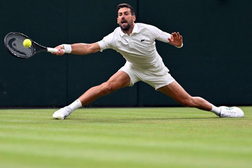Serbia's Novak Djokovic returns the ball to Greece's Stefanos Tsitsipas during their men's singles second round tennis match on the third day of the 2026 Wimbledon Championships at The All England Lawn Tennis and Croquet Club in Wimbledon, southwest London, on July 1, 2026. Kirill KUDRYAVTSEV / AFP