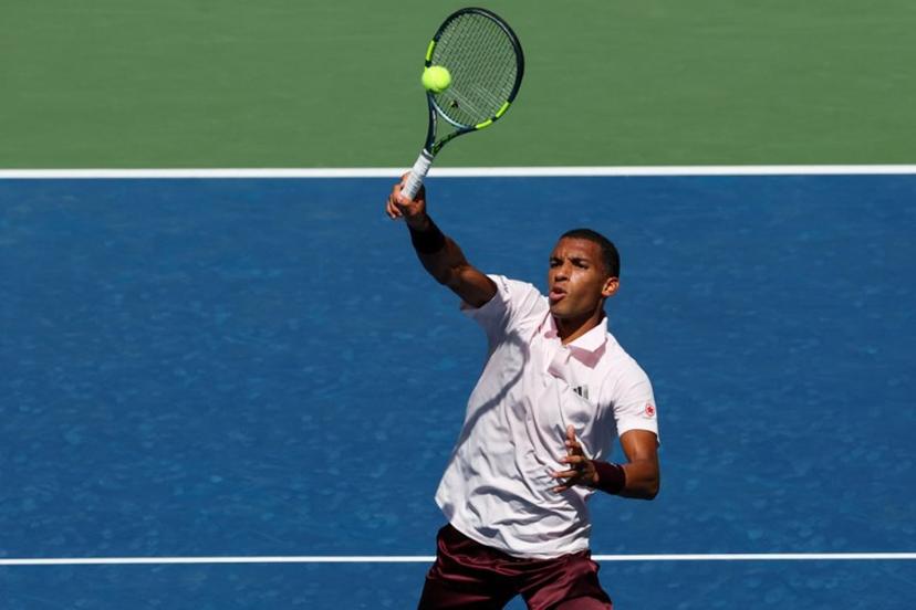 Canada's Felix Auger-Aliassime hits a return to Russia's Karen Khachanov during their men's singles second round tennis match on day five of the US Open tennis tournament at the USTA Billie Jean King National Tennis Center in New York City on September 3, 2026. TIMOTHY A. CLARY / AFP