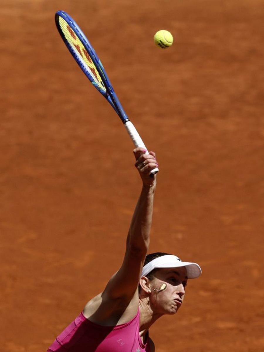 Belgium's Elise Mertens serves to Czech Republic's Karolina Pliskova during their 2026 WTA Tour Madrid Open tennis tournament singles match at the Caja Magica in Madrid, on April 26, 2026. OSCAR DEL POZO / AFP