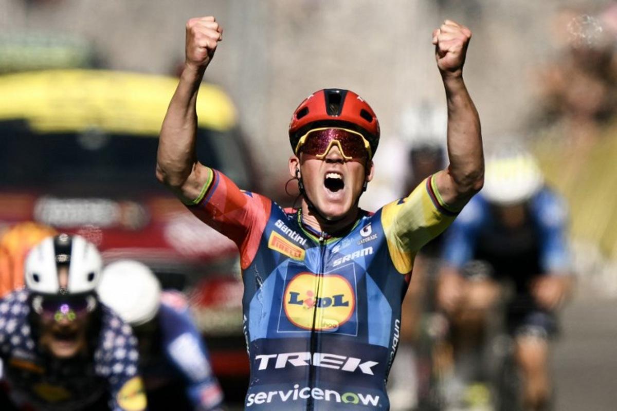 Lidl - Trek team's Danish rider Mads Pedersen celebrates as he crosses the finish line to win the 4th stage of the 113th edition of the Tour de France cycling race, 182 km between Carcassonne and Foix in southwestern France, on July 7, 2026. Jeff PACHOUD / AFP