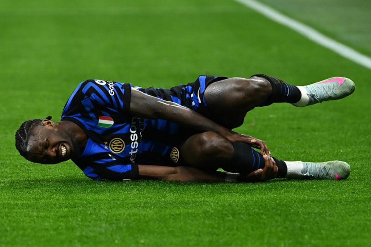 Inter Milan's French forward #09 Marcus Thuram reacts during the UEFA Champions League quarter final second leg football match between Inter Milan and Bayern Munich at the San Siro stadium in Milan on April 16, 2025. Isabella BONOTTO / AFP
