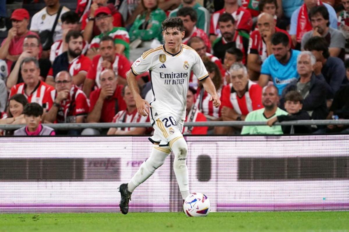 Real Madrid's Spanish defender #20 Fran Garcia controls the ball during the Spanish Liga football match between Athletic Bilbao and Real Madrid at the San Mames stadium in Bilbao on August 12, 2023. CESAR MANSO / AFP
