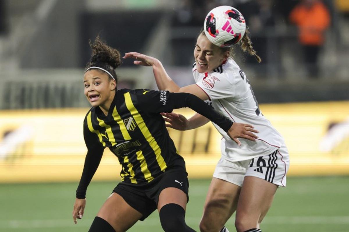 Hacken's Felicia Schroeder (L) and Eintracht Frankfurt's Marthine Ostenstad vie for the ball during the UEFA Women's Europa Cup second leg semi-final football match between BK Hacken and Eintracht Frankfurt at Hisingen Arena in Gothenburg, Sweden, on April 2, 2026. Adam Ihse / TT / TT News Agency / AFP