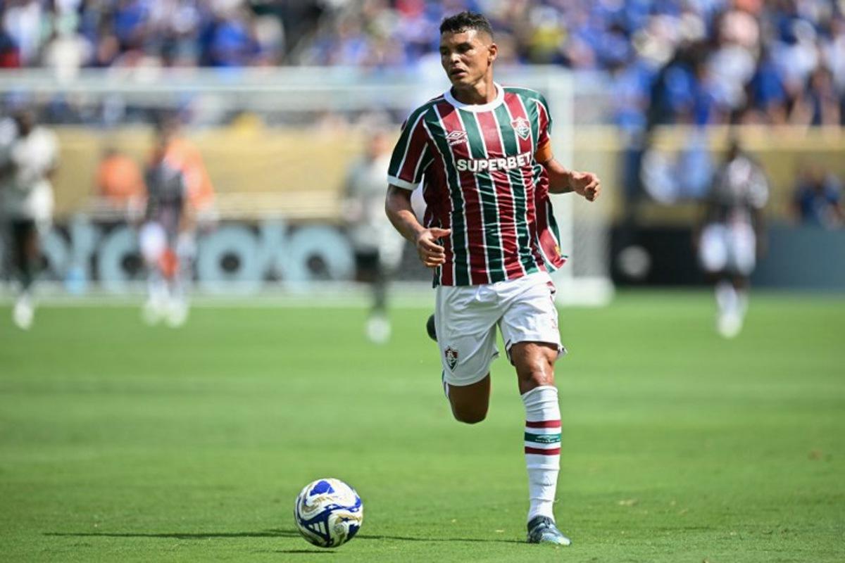 Fluminense's Brazilian defender #03 Thiago Silva runs with the ball during the FIFA Club World Cup 2025 semifinal football match between Brazil's Fluminense and England's Chelsea at the MetLife stadium in East Rutherford, New Jersey on July 8, 2025. Paul ELLIS / AFP