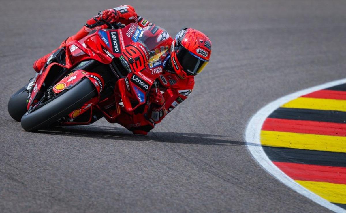 Ducati Lenovoi Team's Spanish MotoGP rider Marc Marquez steers his bike during the second practice session of the MotoGP German motorcycle Grand Prix at the Sachsenring racing circuit, in Hohenstein-Ernstthal near Chemnitz, eastern Germany on July 11, 2025. Ronny Hartmann / AFP