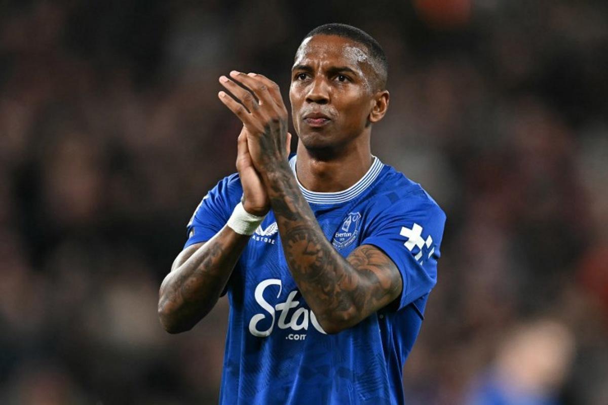 Everton's English defender #18 Ashley Young applauds the fans following the English Premier League football match between Liverpool and Everton at Anfield in Liverpool, north west England on April 2, 2025. Paul ELLIS / AFP