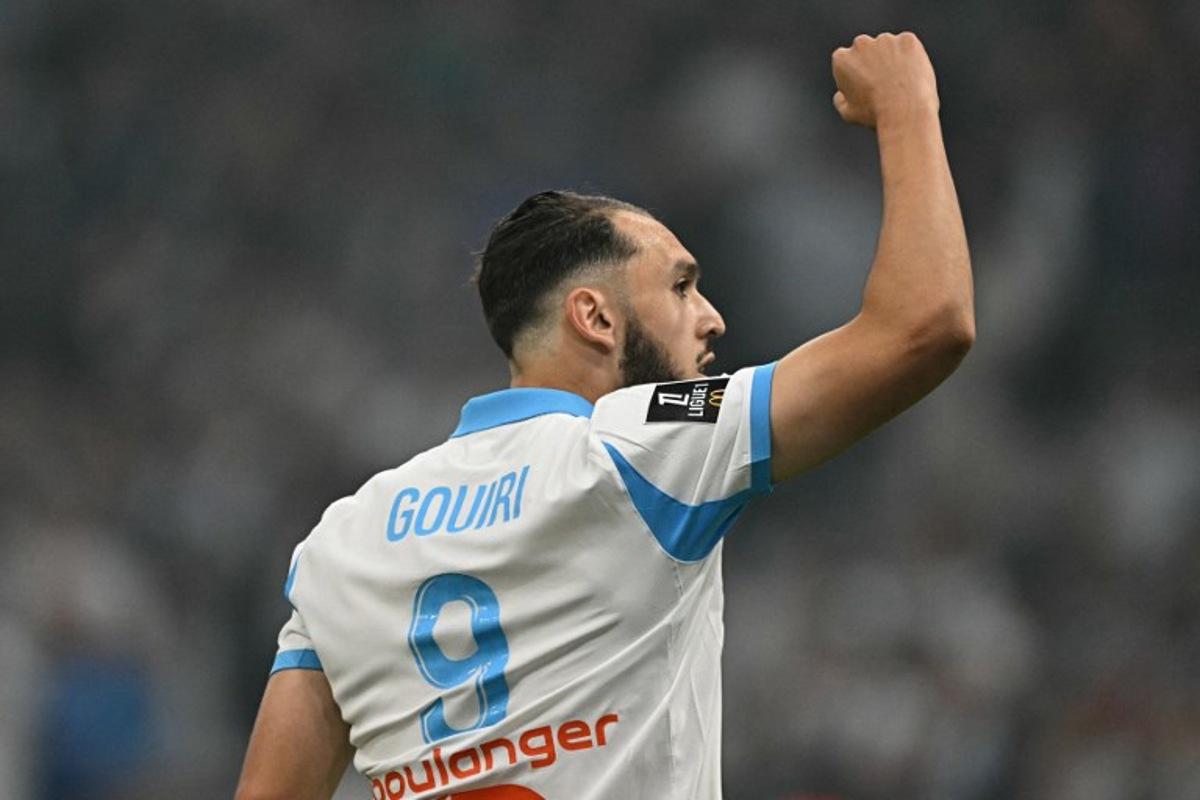 Marseille's Algerian forward #09 Amine Gouiri celebrates scoring his team's second goal during the French L1 football match between Olympique de Marseille (OM) and Stade Rennais FC at the Stade Velodrome in Marseille, southern France, on May 17, 2026. Gabriel BOUYS / AFP