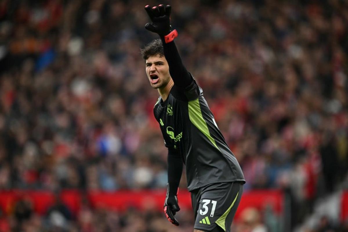 Manchester United's Belgian goalkeeper #31 Senne Lammens gestures during the English Premier League football match between Manchester United and Sunderland at Old Trafford in Manchester, north west England, on October 4, 2025. Paul ELLIS / AFP