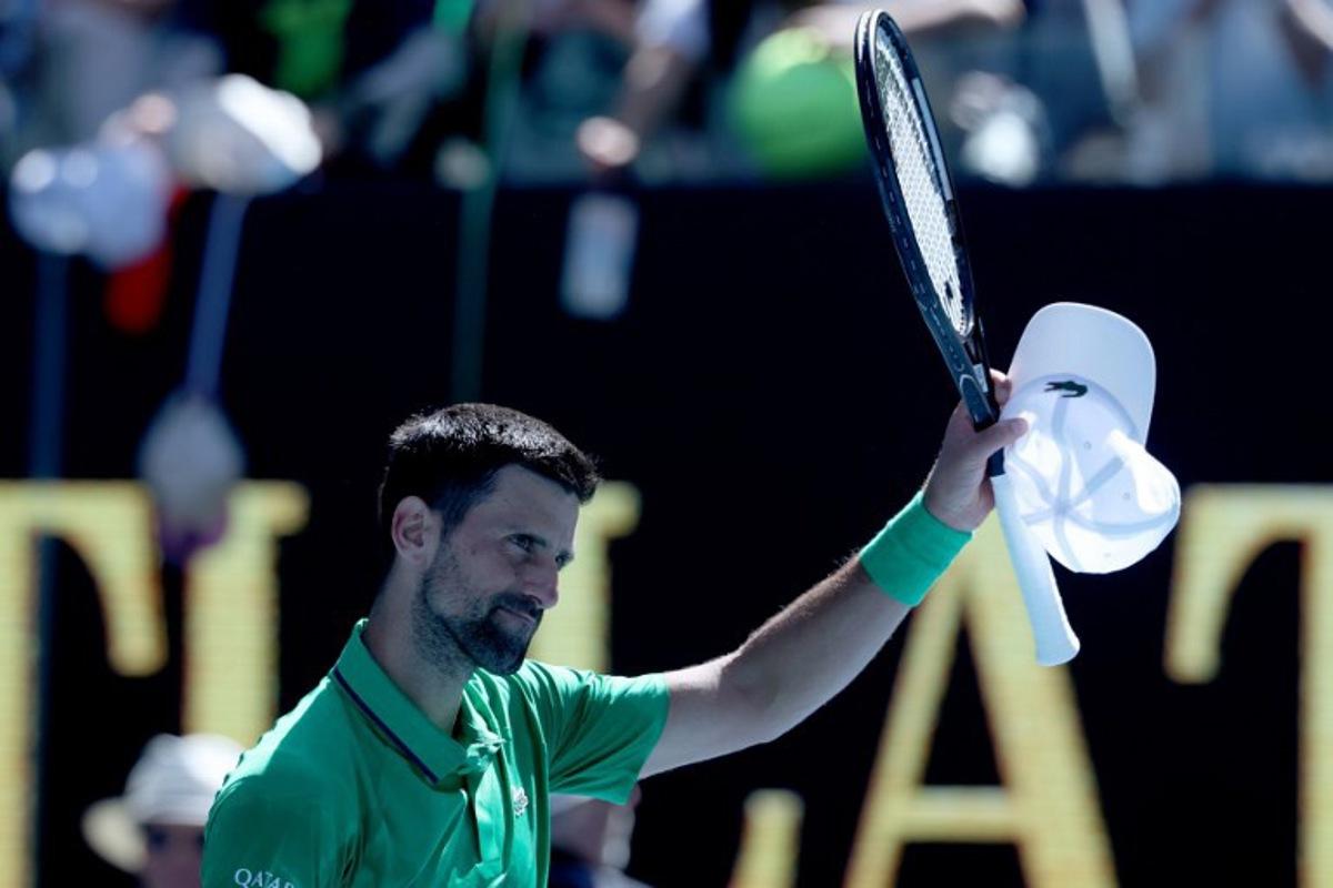 Serbia's Novak Djokovic celebrates victory over Italy's Francesco Maestrelli after their men's singles match on Day 5 of the Australian Open tennis tournament in Melbourne on January 22, 2026. DAVID GRAY / AFP