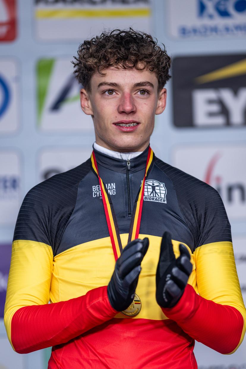 Belgian Lars Peers celebrates on the podium after winning the Novices second year men race at the Belgian Cyclocross Championships in Beringen on Sunday 11 January 2026. BELGA PHOTO DAVID PINTENS