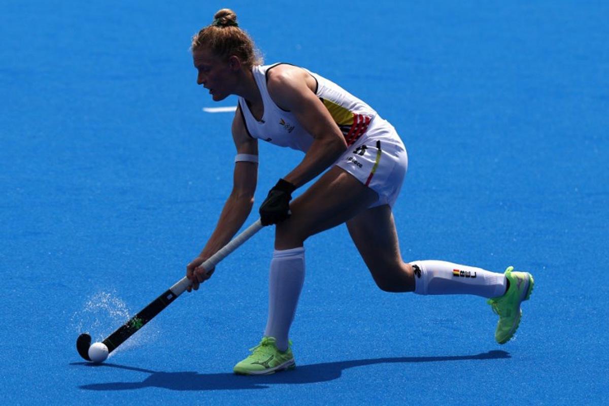 Belgium's defender #08 Emma Puvrez passes the ball in the women's pool A field hockey match between Belgium and the Netherlands during the Paris 2024 Olympic Games at the Yves-du-Manoir Stadium in Colombes on August 2, 2024. Ahmad GHARABLI / AFP