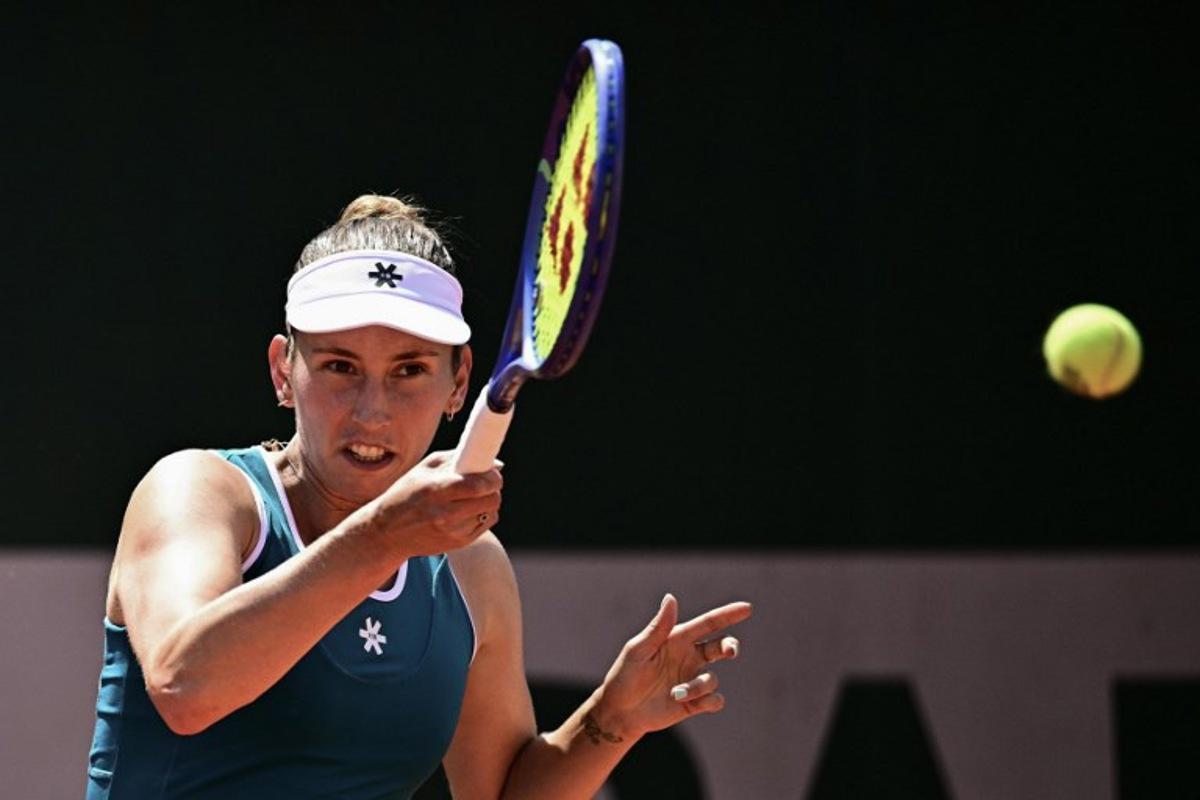Belgium's Elise Mertens plays a forehand return to Poland's Maja Chwalinska during their women's singles match on day 5 of the French Open tennis tournament at the Roland-Garros Complex in Paris on May 28, 2026. JULIEN DE ROSA / AFP