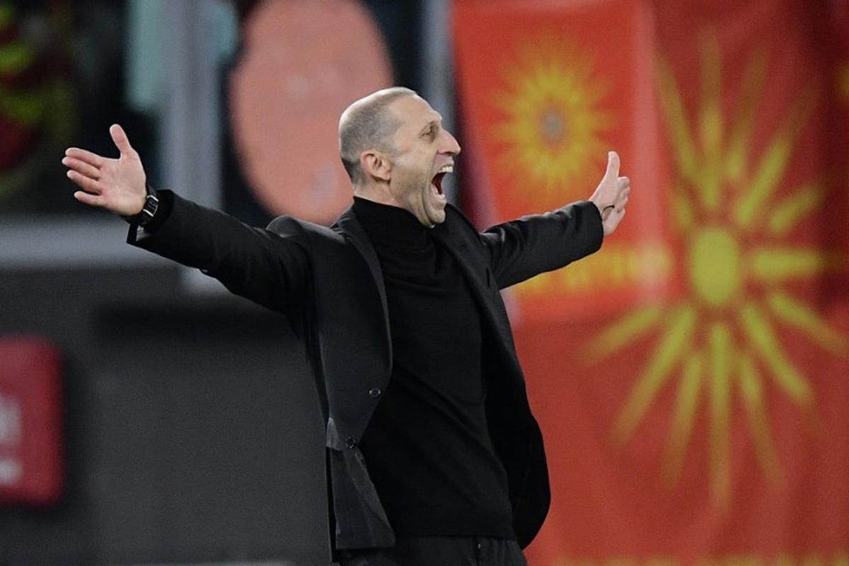 North Macedonia 's coach Blagoja Milevski celebrates the team's second goal during the UEFA Euro 2024 qualifying Group C football match between Italy and North Macedonia at the Olympic Stadium in Rome on November 17, 2023. Filippo MONTEFORTE / AFP