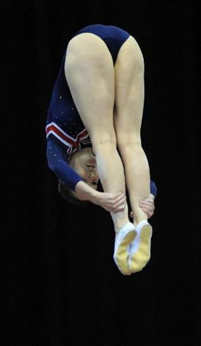 Katherine Driscoll of Britain performs during the women's Trampoline team final at the Trampoline and Tumbling World Championships at the National indoor Arena in Birmingham, central England on November 18, 2011. AFP PHOTO/ ANDREW YATES