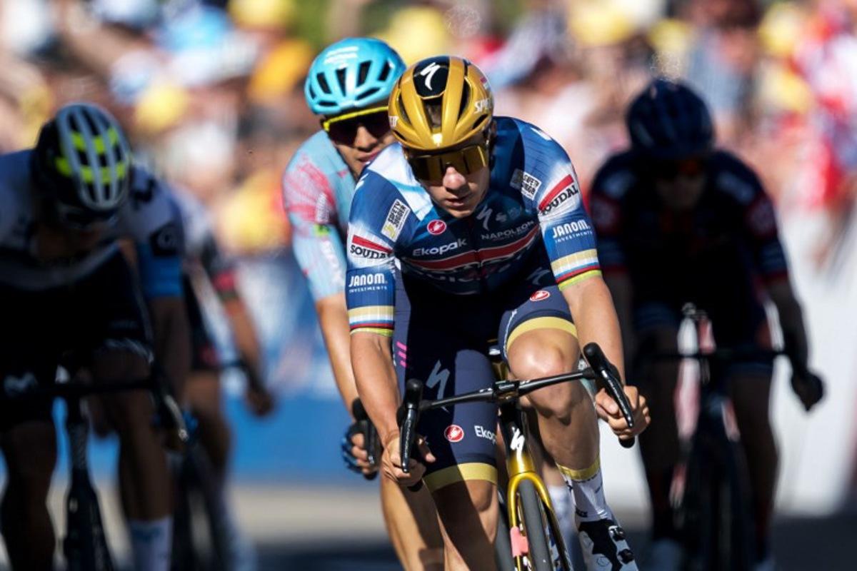Belgium's Remco Evenepoel (Quick-Step) crosses the finish line of the second stage of the Tour of Romandie UCI cycling World tour, 157km loop from the start to the finish in La Grande Beroche, in Saint-Aubin-Sauges on May 1, 2025. Fabrice COFFRINI / AFP