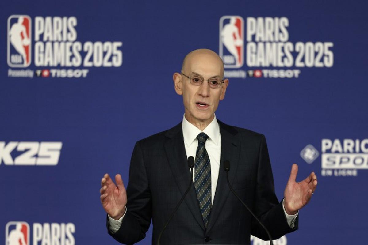 NBA commissioner Adam Silver delivers remarks during a press conference prior to the NBA basketball game between the Indiana Pacers and the San Antonio Spurs at the Accor Arena - Palais Omnisports de Paris-Bercy - in Paris on January 23, 2025. FRANCK FIFE / AFP